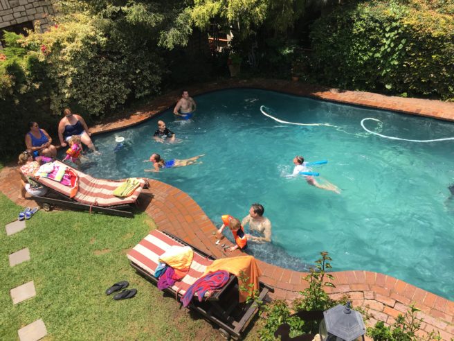 Families swimming in the pool